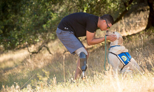 Disabled veteran with his service dog