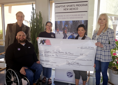 Marc and Joanne Kagan deliver a grant to the ASPNM